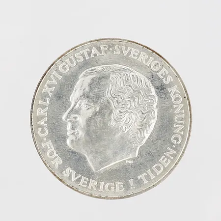 Minnesmynt Carl XVI Gustaf Sveriges konung, För Sverige i tiden, 1980 Successionsrätt, nominellt värde 200kr, Ø36mm, 925/1000 silver Vikt: 27 g