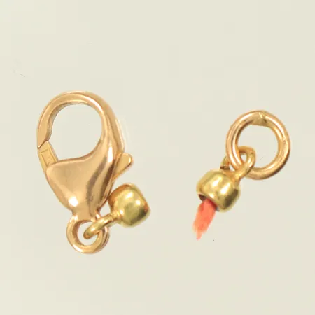Diverse guld, lås kabinhake, 10x6mm, ögla ca 7x4mm 18K Vikt: 1,2 g