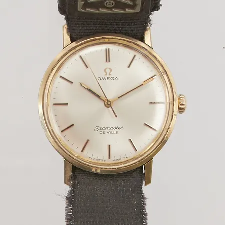 Herrur Omega Seamaster De Ville, 34,5mm, guld på stål, manuell, gravyr, monocoque, boettnr: CD.135020, verknr: 29902586, repigt plexiglas, tillhörande box, inga övriga tillbehör.