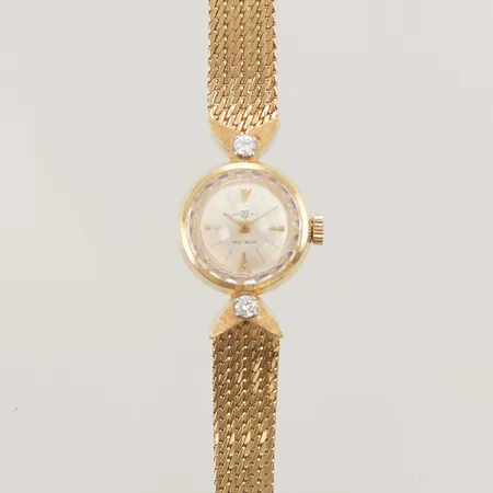 Damur Jan Wic 18K, 17mm, manuell, boettnr: 105033 21840 4integrerad länk i 18K, längd inklusive uret: 16cm, bruttovikt: 24,6g.