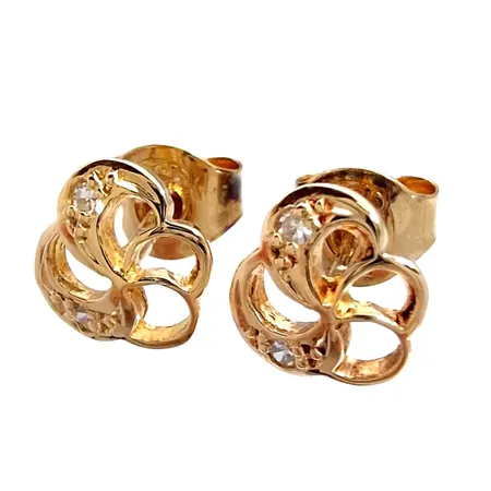 Örhängen, 18K guld, Diamanter 4 x 0,005ct, örhängenas diameter 6,5 mm, originalploppar, fint skick Vikt: 1,1 g