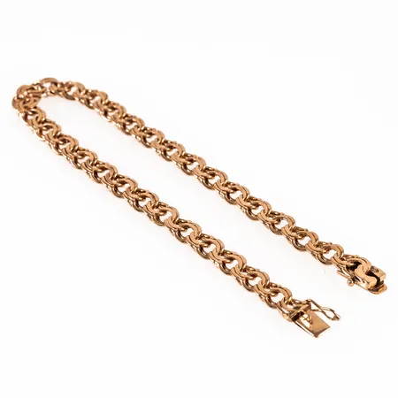 Armband bismarck i 18K guld. Det är 20,5 cm långt, 6 mm brett och  väger 12,3g. Kistlås. Oläslig tillverkarstämpel, 18K, kattfot. 