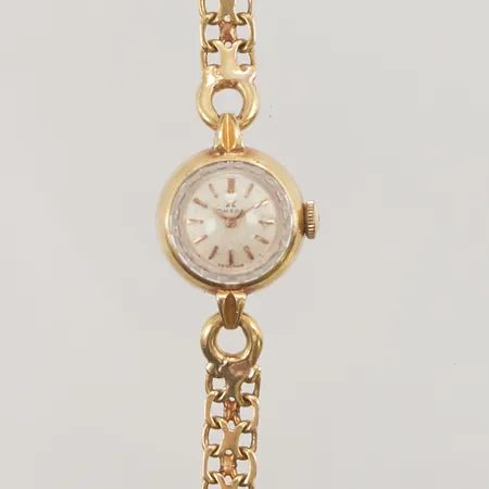 Damur Omega 18K, 17mm, manuell, cal. 483, boettnr: 10957 61, verknr: 18083491, servicebehov, integrerad länk x-länk i 18K, längd inklusive uret: 17cm, bredd. 6,5mm, bruttovikt: 21,0g.