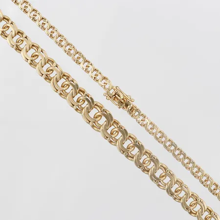 Kedja, Bismarck, doserad, 44cm, bredd 4-9mm, tillverkad av Svenska Guldvaruaktiebolaget T Be, år 1960, 18K Vikt: 26 g