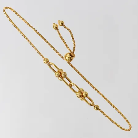 Armband, justerbar storlek, bredd 1-6mm, 21K.  Vikt: 3,7 g