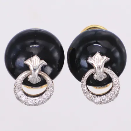 Ett par örhängen med briljantslipade diamanter ca 0,35ctv, längd 22mm, clips, Dan Tillberg, Saltsjöbaden, år 1992, svart emalj, vitguld/rödguld, 18K Vikt: 12,3 g