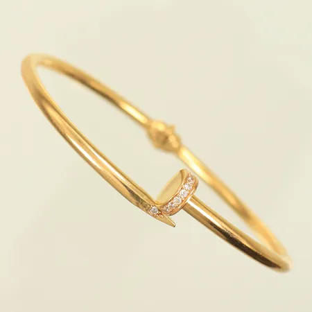 Armring öppningsbar med vita stenar, innermått ca58x52mm, bredd 3mm, 21K Vikt: 8,3 g