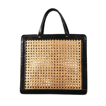 Handväska, Palmgrens, Stockholm, 1980-tal, naturfärgad rotting med svarta läderdetaljer, ca 28x32x9,5cm, bruksslitage, ytliga torrsprickor. 