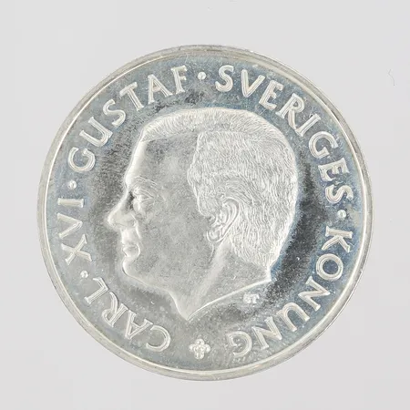 Jubileumsmynt, 100 Kronor, Delawere 1638-1988, Ø32mm, 925/1000 silver. Vikt: 16,1 g