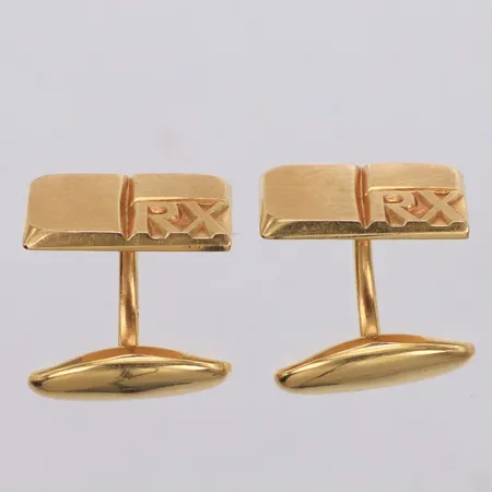 Ett par manschettknappar, 20x23mm, monogram, sporrong, 18K Vikt: 24,9 g