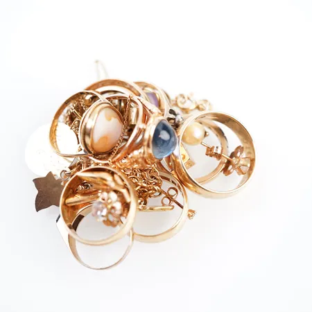 Div guld, 18k. Vikt: 57,4 g