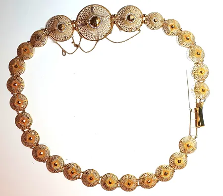 Guldbälte längd 64cm, bredd 24.52mm, 21k Vikt: 121,5 g