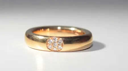 1 vigselring 0,10ct HS 18k 11,2 gr Ø 17,75 mm Vikt: 11,2 g