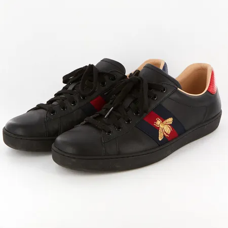 Ett par Gucci Ace sneakers, svart skinn, stl 9 (43) numrerade 429426 