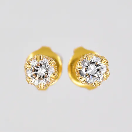 Ett par örhängen, diamanter ca 0,23ct/st, Ø 5mm, stoppar ej guld, 18K Vikt: 1,1 g