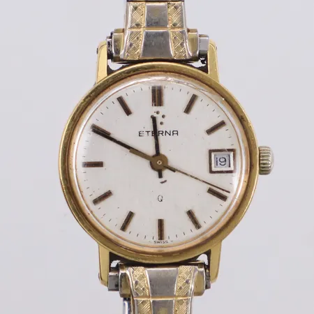 Damur Eterna, går ej, krona lös, personlig gravyr, boett 18K, flexband i stål