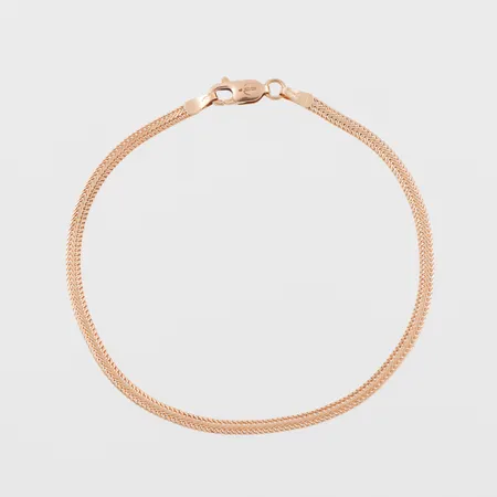 Armband, längd ca 18 cm,bredd 2.4 mm,18k. Vikt: 2,8 g