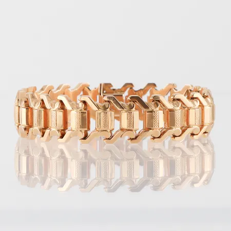 Armband längd ca 19.5 cm, bredd 15.6 mm, 18k. Vikt: 26,7 g