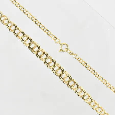 Collier Bismarck, doserad, längd 42½ cm, bredd 3-6 mm, 18K. Vikt: 8,6 g