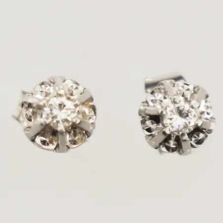 Ett par örhängen, diamanter 2xca0,07ct, vitguld, en snurrebuss i silver, 14K Vikt: 1,7 g