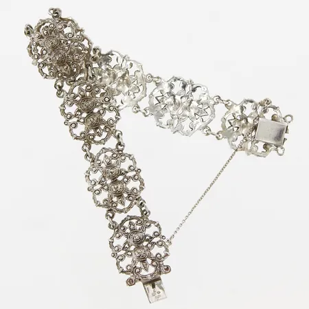 Armband halvstelt med markasiter, genombruten dekor, innermått 17cm, bredd: 20mm, silver 830/1000 Vikt: 23,7 g