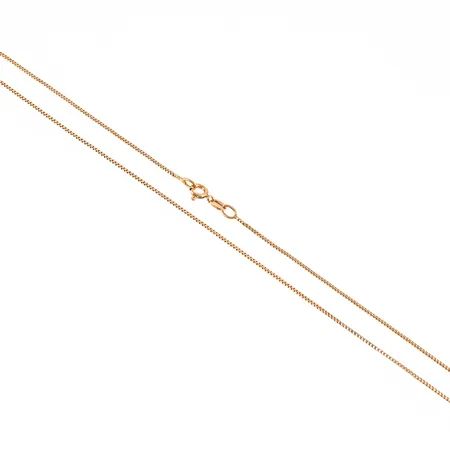 Kedja Venezia i 18K guld. Den är 41 cm lång, 0,9 mm bred och väger 2,8g. Slapp och nött springring, vridning i länk.