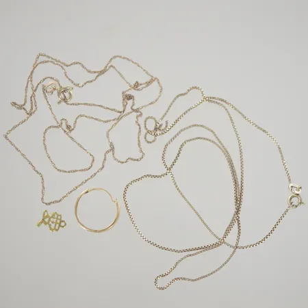 skrot, 9k 2,76 gr + 18k 0,64 gr Vikt: 3,4 g