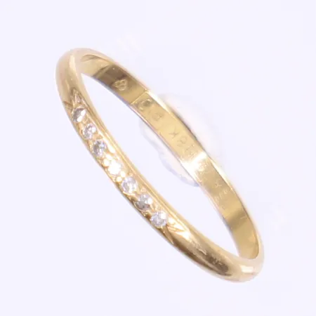 Ring med diamanter totalt 0,05ctv enligt gravyr, stl 18¼, bredd 2mm, 18K Vikt: 1,7 g
