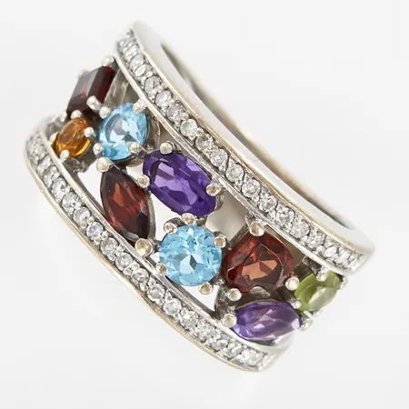 Ring, stl cirka 15, bredd 5,5-10mm, 40st diamanter, 0,30ctv, samt ametist, citrin, topas, peridot, rhodolit och granat, skev, GHA, vitguld 18K Vikt: 7 g
