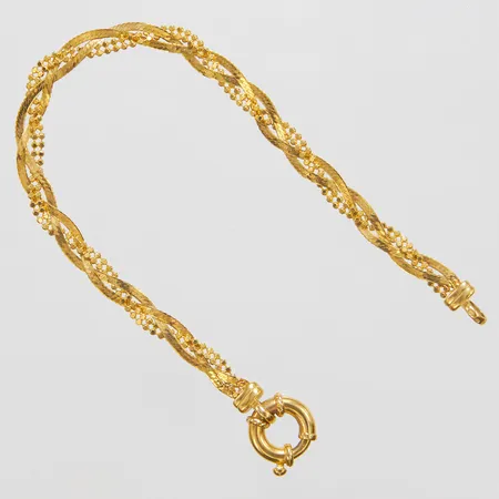 Armband, flätat, längd ca 18cm, bredd 3,5mm, 14K Vikt: 5,4 g