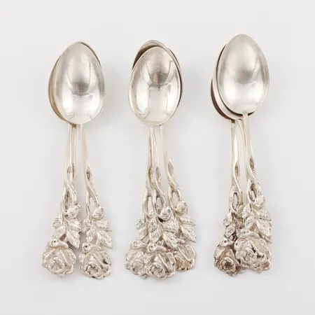 Skedar 9 st "Rosen",längd ca 10.5 cm,silver. Vikt: 92,8 g