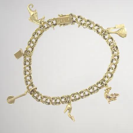 Armband med berlocker, längd 19,5 cm, bredd 6 mm, 18K Vikt: 20,2 g