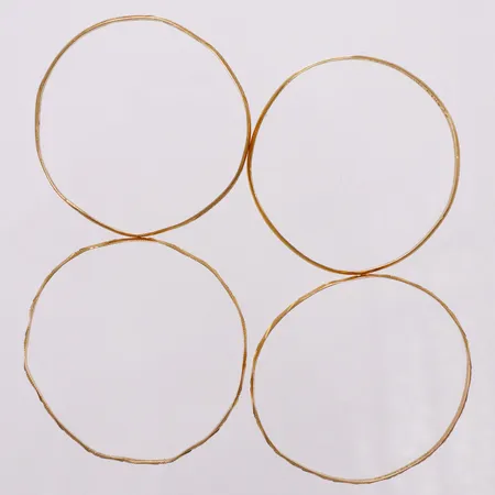 4 barnarmringar, ca Ø40-45mm, buckliga, 22K Vikt: 16,1 g