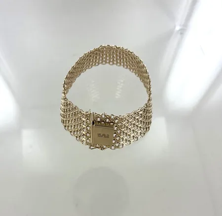 Armband x-länk, längd 20,5 cm, bredd 2,8 cm, 1 lås8 saknas, 18K Vikt: 54,5 g