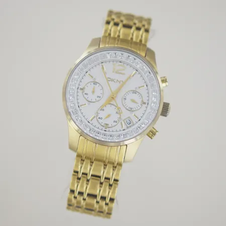 Damur DKNY 250906, diam 43 mm, behov av nytt batteri.