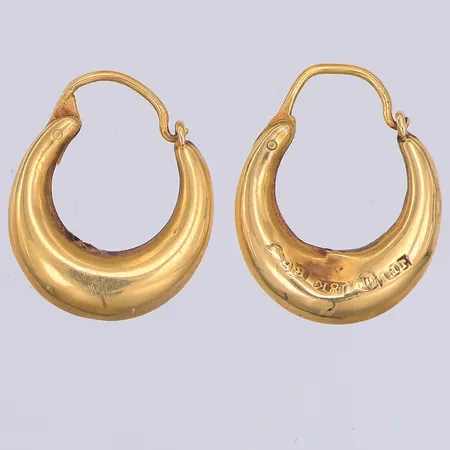 Ett par örhängen, creoler, 19mm, år 1880, buckla på ena, 18K Vikt: 1,6 g