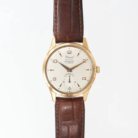 Herrur Royal De Luxe, stål/doublé, manuell, Ø34,5mm, liten sekundvisare, repor, läderband med slitage, inga tillbehör.