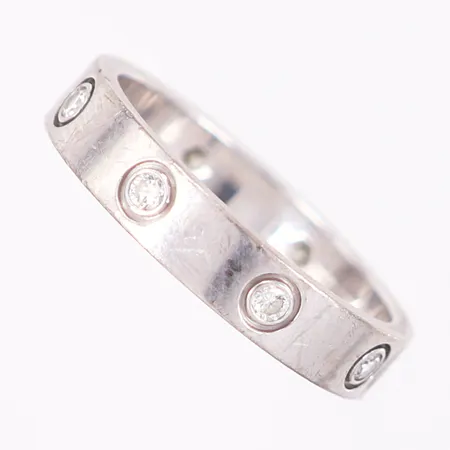 Ring Cartier, Love, stl 17¼ (55), bredd: 4,0mm, diamanter 8 x ca 0,02ct, vitguld, etui, 18K  Vikt: 4,9 g