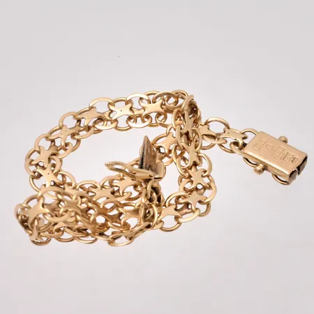 Defekt guld, 18K, vikt 8,96g.