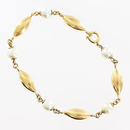 Armband, odlade pärlor Øca6mm, 18,3cm, bredd 6mm, smärre bucklor, 18K. Bruttovikt: 6,5gram. Vikt: 6,5 g