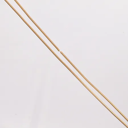 Kedja Ormlänk. längd 67cm, defekt utan lås, 18k Vikt: 13 g