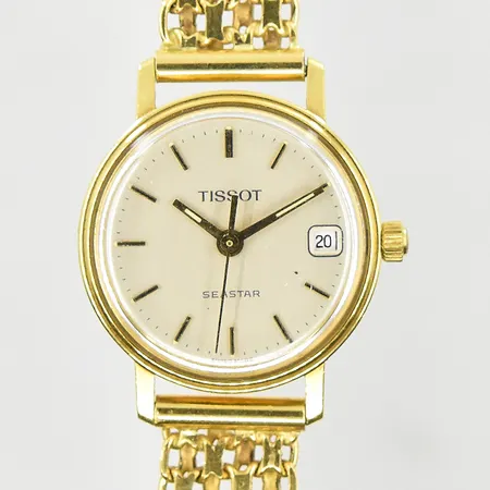 Damur Tissot Seastar 18K, boett Ø22 mm, quartz, datum, armband X-länk, bredd 10 mm, behov av batteribyte, bruttovikt 25,9g, 18K.