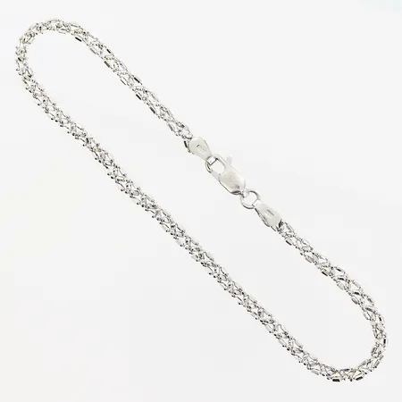 Armband, 19,2cm, bredd 3mm, vitguld, smärre skevheter, 18K.  Vikt: 3,4 g