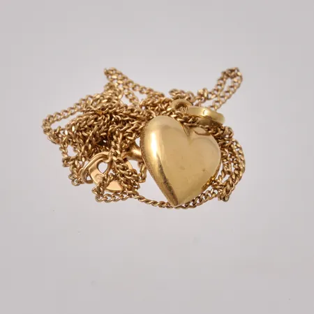 Diverse defekt guld, 18K, vikt 2,2g.