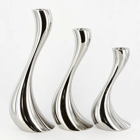 Tre Ljusstakar Georg Jensen Cobra, Constantin Wortmann, höjd 16cm, 20cm samt 24cm, polerat rostfritt stål, smärre bruksslitage