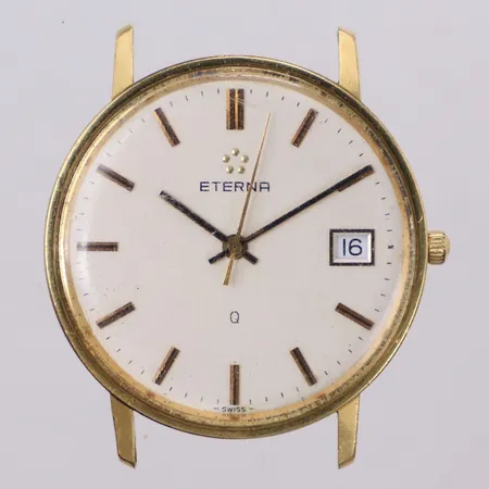 Herrur Eterna, Ø33,5mm, quartz, datum, buckla, batteribyte krävs, gravyr, 18K. Bruttovikt 19,8g