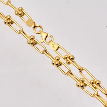 Kedja i 22K guld, 51,5cm, bredd 5-6,1mm, vikt 19,88g.