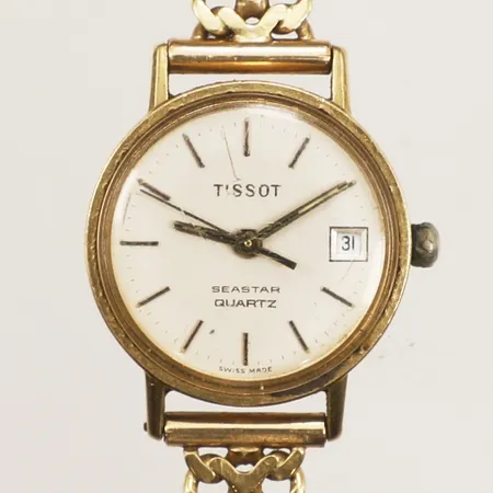 Damur Tissot, boett i 18K, länk i guld, går ej, gravyr, 18K Vikt: 26,1 g