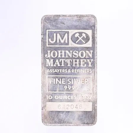 Silvertacka, "Johnson Matthey", 10 ounches troy, serienr:642048, finsilver, oxiderad, smärre nagg, 999/1000 Vikt: 311 g