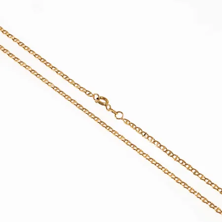 Kedja gles Pansar med stav i 18K guld. Den är 51 cm lång, 2,5 mm bred och väger 4,1g. Springring.